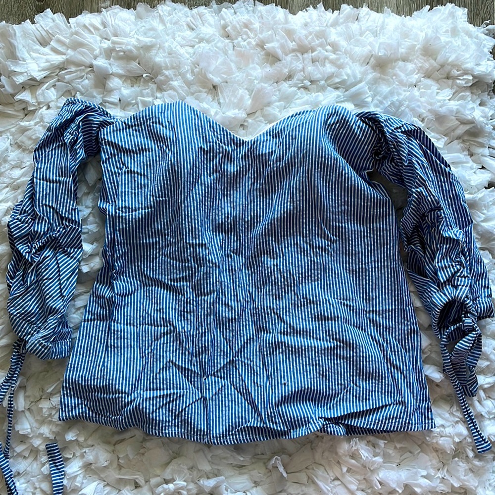 long sleeve blue and white striped off the shoulder top with ruffled sleeves